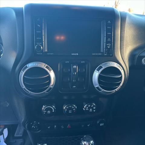 used 2014 Jeep Wrangler Unlimited car, priced at $22,290