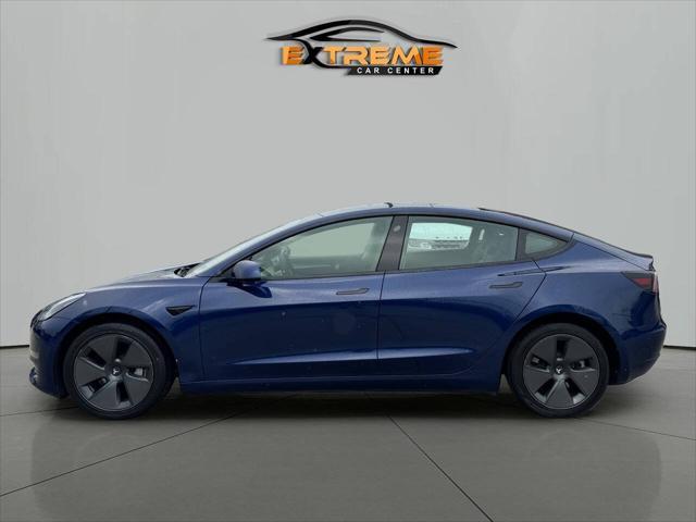 used 2022 Tesla Model 3 car, priced at $18,995