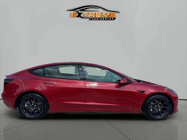 used 2022 Tesla Model 3 car, priced at $17,495