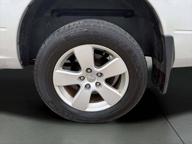 used 2012 Ram 1500 car, priced at $12,995