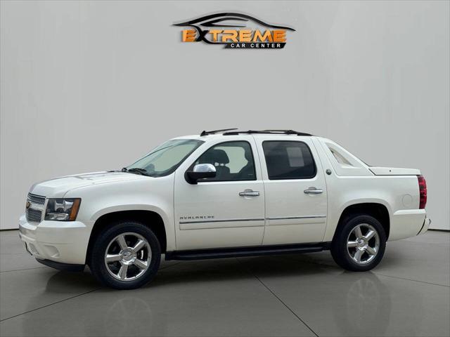 used 2013 Chevrolet Avalanche car, priced at $12,495