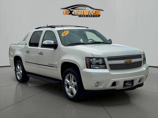 used 2013 Chevrolet Avalanche car, priced at $12,495