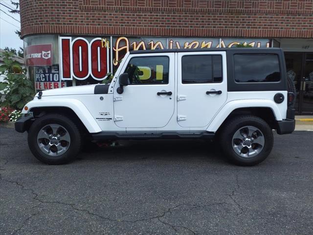 used 2018 Jeep Wrangler JK Unlimited car, priced at $23,394