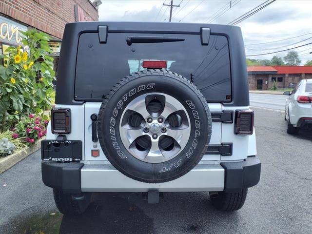 used 2018 Jeep Wrangler JK Unlimited car, priced at $23,394