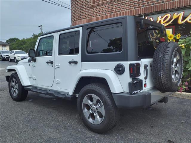 used 2018 Jeep Wrangler JK Unlimited car, priced at $23,394