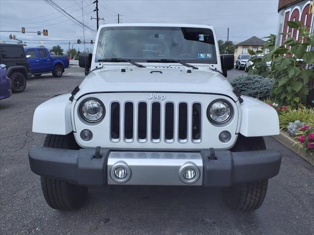 used 2018 Jeep Wrangler JK Unlimited car, priced at $23,394