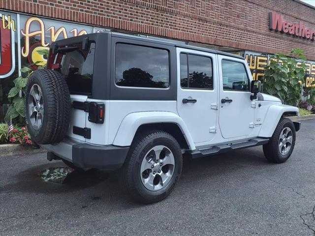 used 2018 Jeep Wrangler JK Unlimited car, priced at $23,394