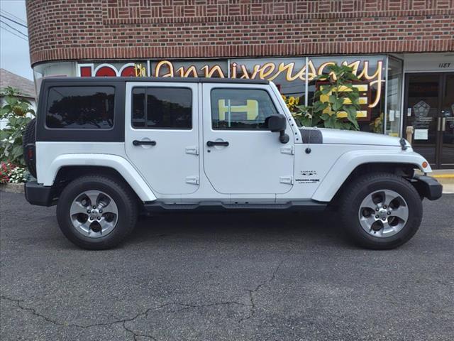 used 2018 Jeep Wrangler JK Unlimited car, priced at $23,394