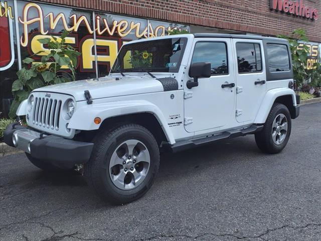 used 2018 Jeep Wrangler JK Unlimited car, priced at $23,394