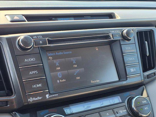used 2015 Toyota RAV4 car, priced at $14,000