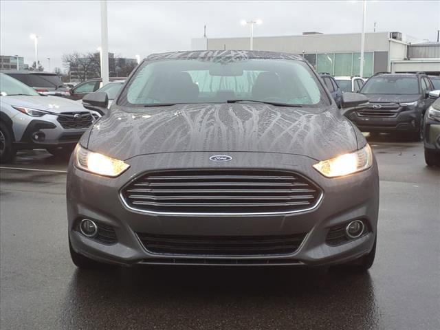 used 2014 Ford Fusion car, priced at $14,000