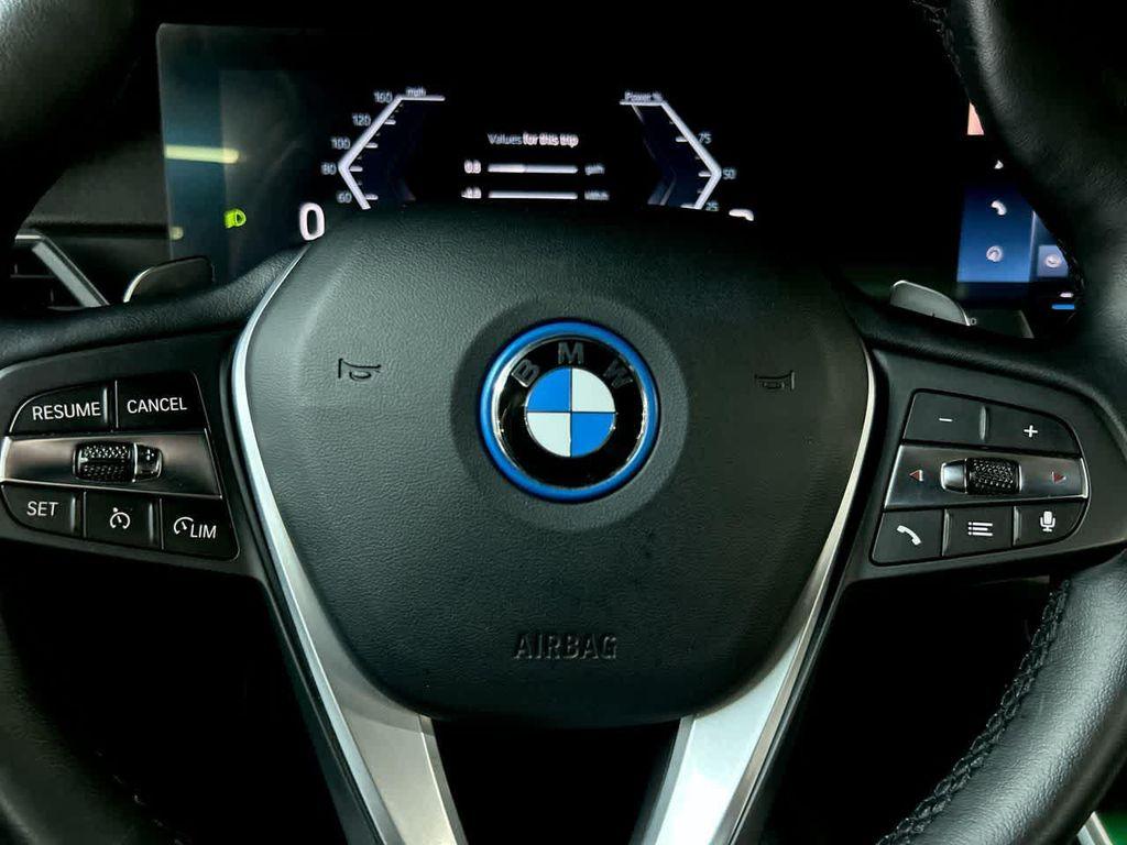 used 2023 BMW 330e car, priced at $27,000