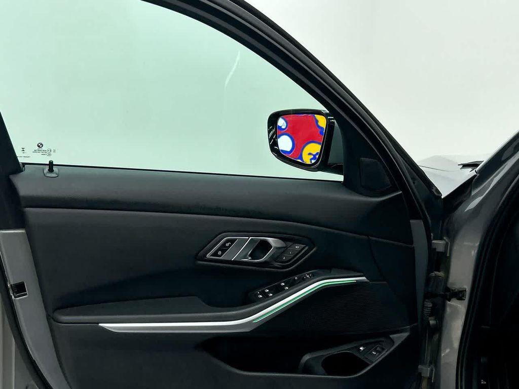 used 2023 BMW 330e car, priced at $27,000