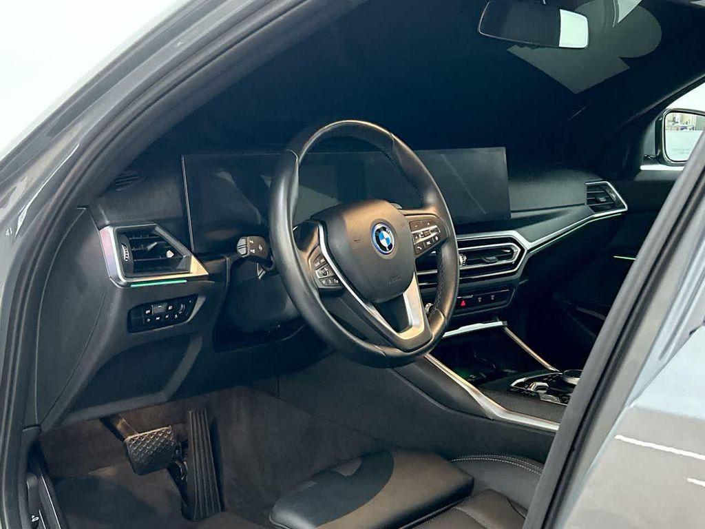 used 2023 BMW 330e car, priced at $27,000