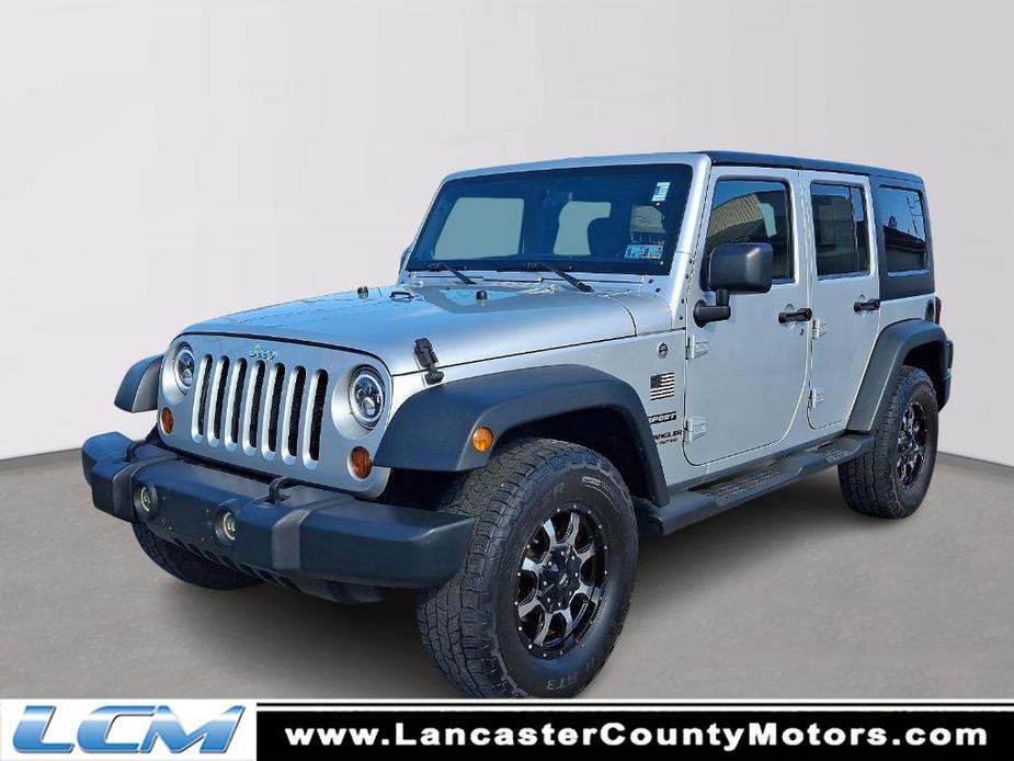 used 2012 Jeep Wrangler Unlimited car, priced at $13,949