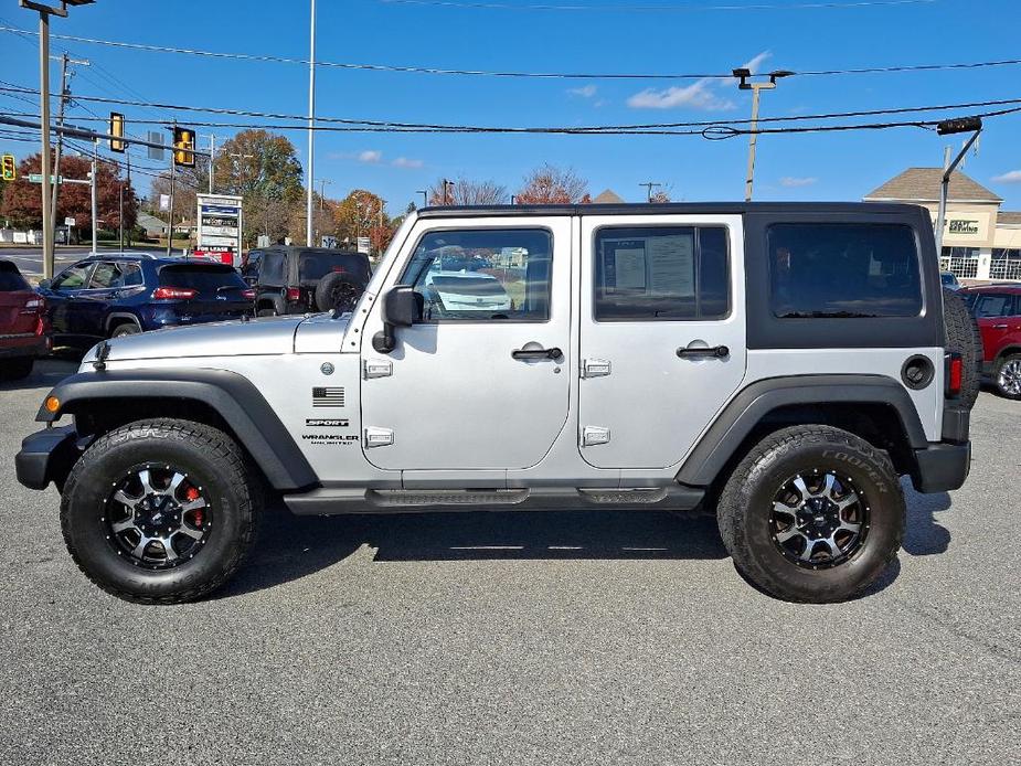 used 2012 Jeep Wrangler Unlimited car, priced at $13,949