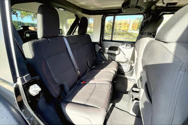 used 2023 Jeep Wrangler car, priced at $38,705