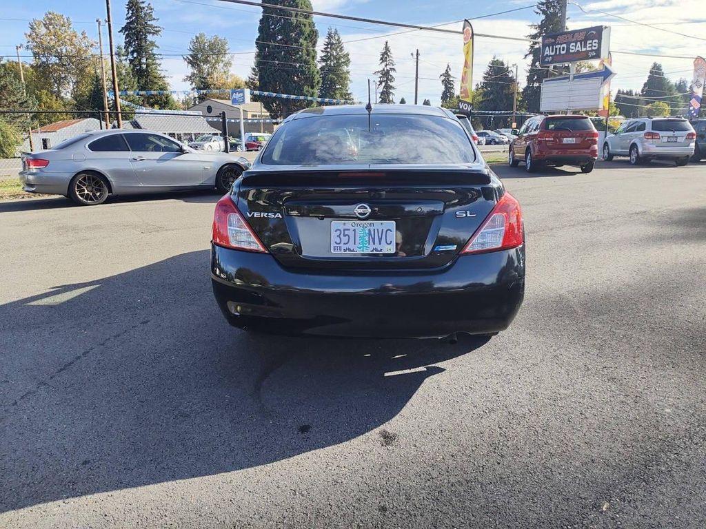 used 2013 Nissan Versa car, priced at $4,650