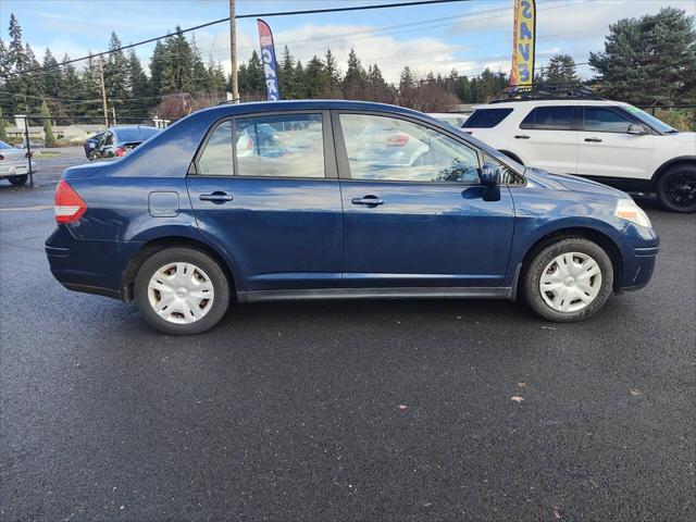 used 2011 Nissan Versa car, priced at $4,250