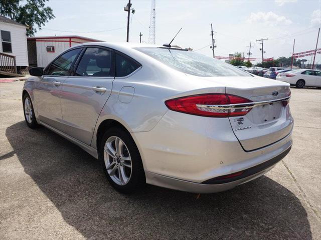 used 2018 Ford Fusion car, priced at $15,900