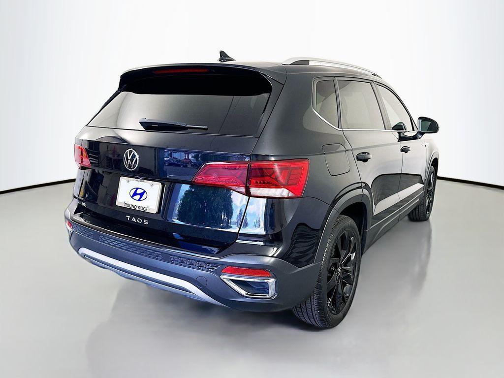 used 2023 Volkswagen Taos car, priced at $18,500