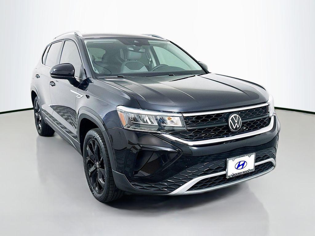used 2023 Volkswagen Taos car, priced at $18,500