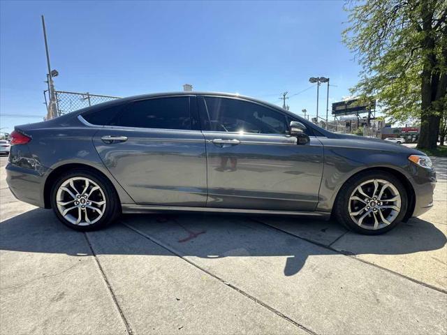 used 2020 Ford Fusion car, priced at $10,995