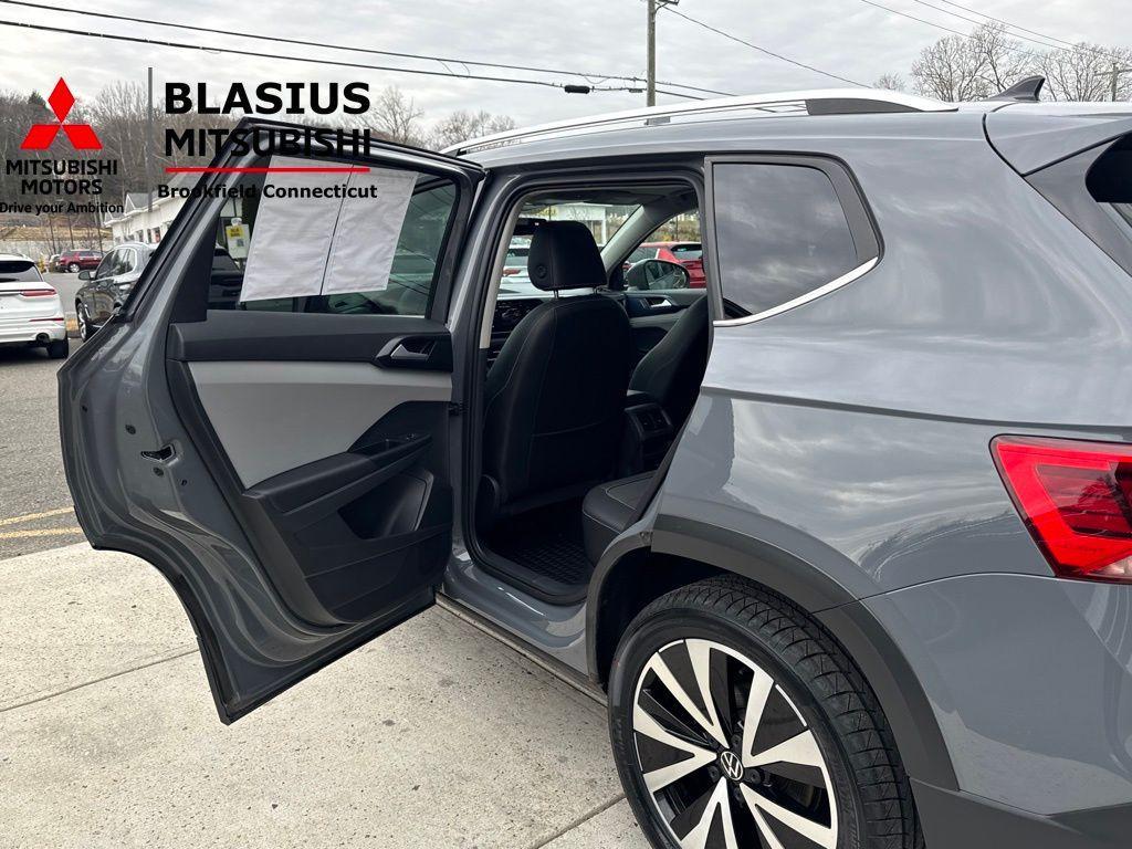 used 2023 Volkswagen Taos car, priced at $18,989