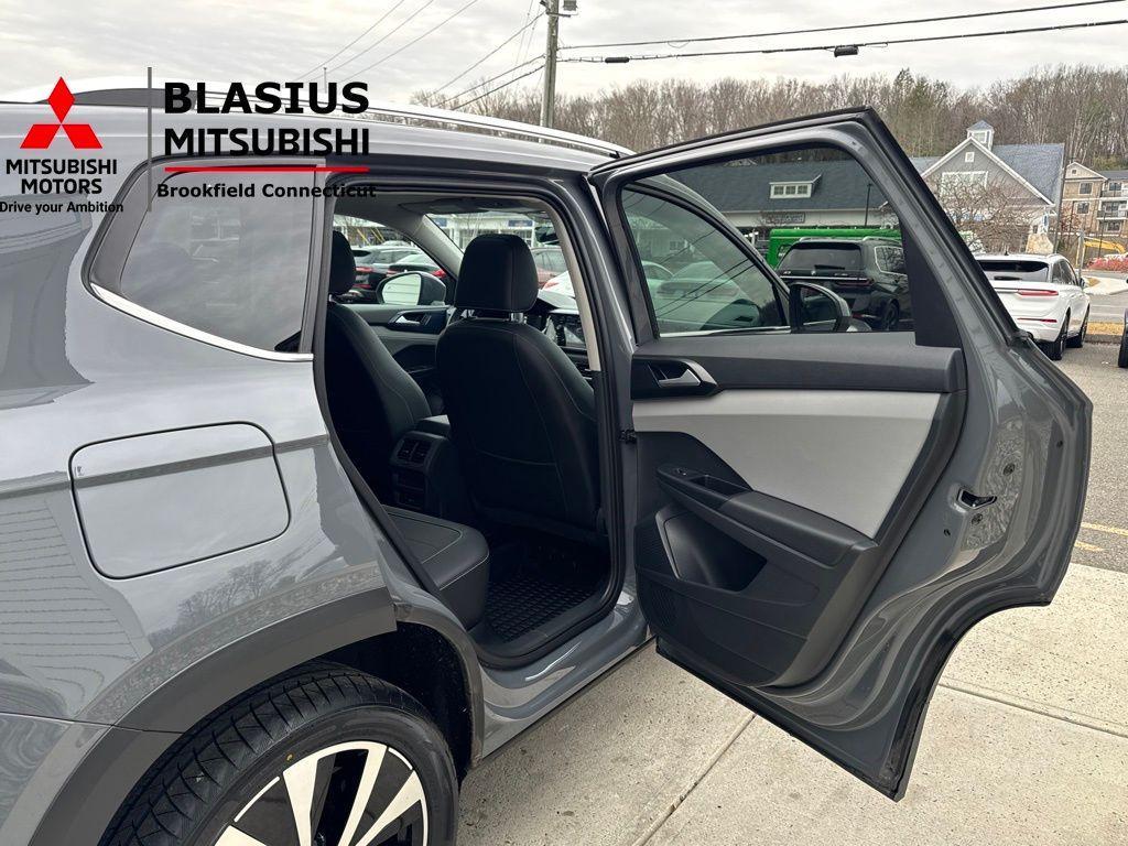 used 2023 Volkswagen Taos car, priced at $18,989