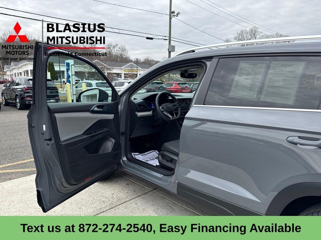 used 2023 Volkswagen Taos car, priced at $18,989