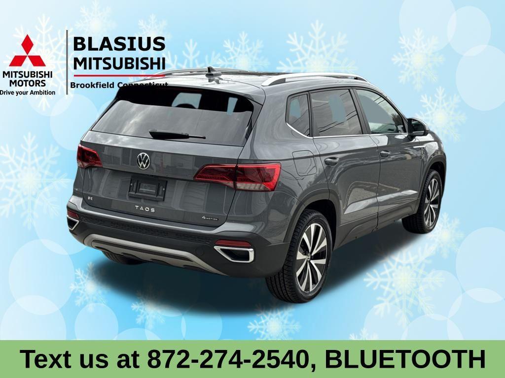 used 2023 Volkswagen Taos car, priced at $18,989
