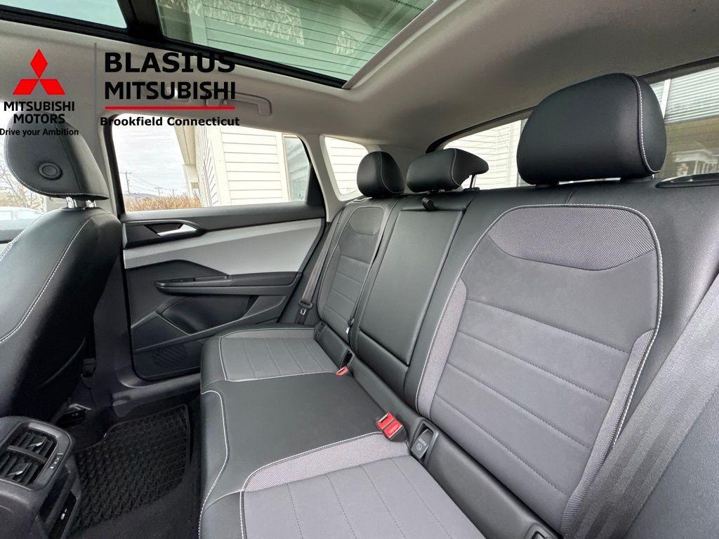 used 2023 Volkswagen Taos car, priced at $18,989