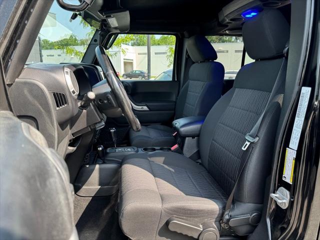 used 2012 Jeep Wrangler Unlimited car, priced at $12,994