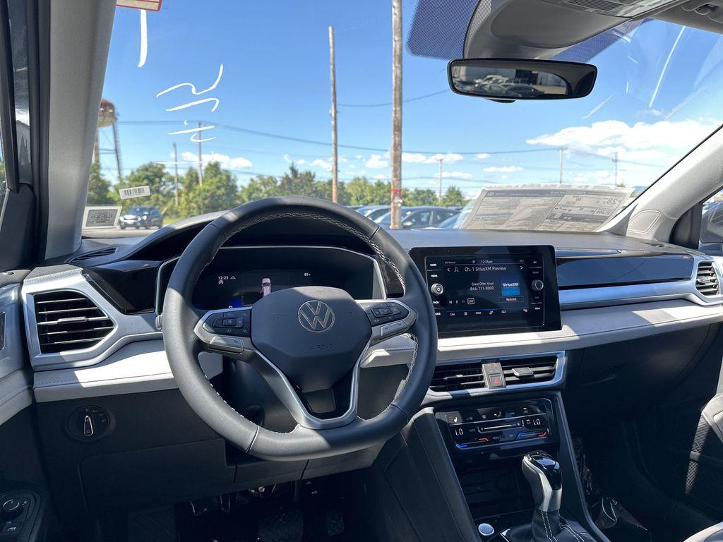 new 2025 Volkswagen Taos car, priced at $28,721