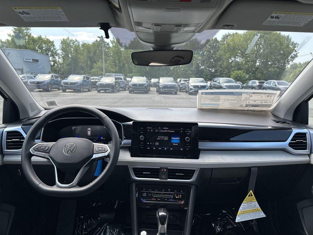 new 2025 Volkswagen Taos car, priced at $28,221