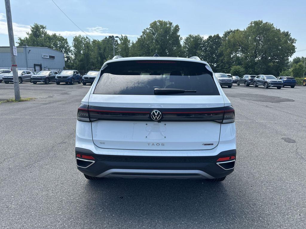 new 2025 Volkswagen Taos car, priced at $28,221
