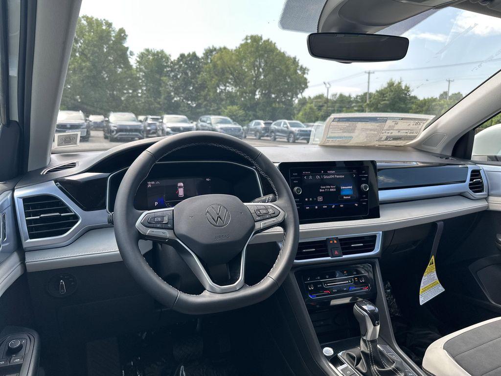 new 2025 Volkswagen Taos car, priced at $28,221