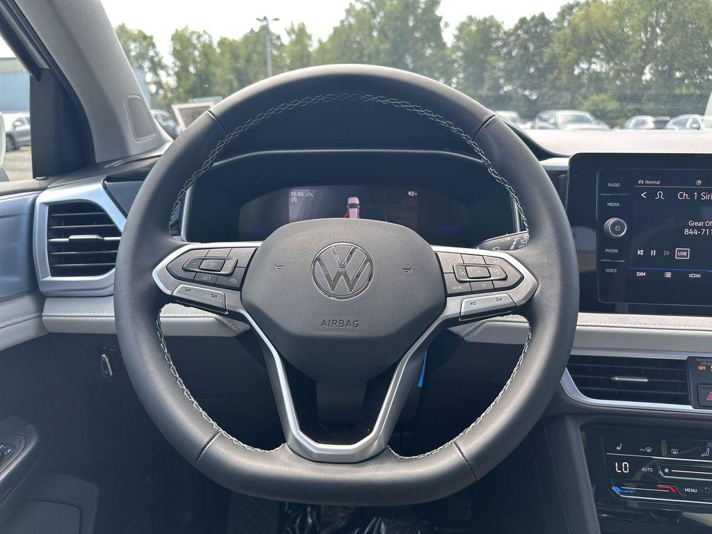 new 2025 Volkswagen Taos car, priced at $28,221