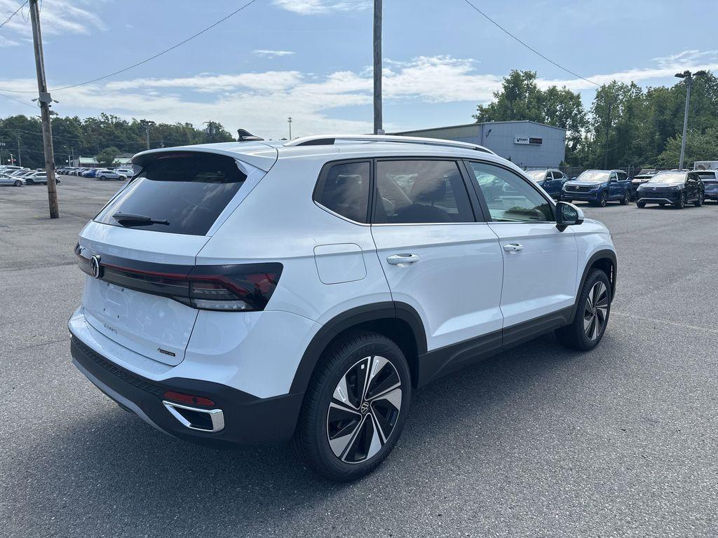 new 2025 Volkswagen Taos car, priced at $28,221