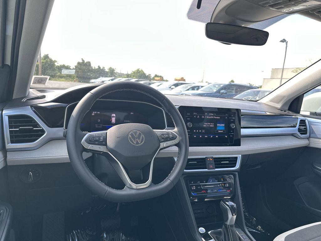 new 2025 Volkswagen Taos car, priced at $29,921