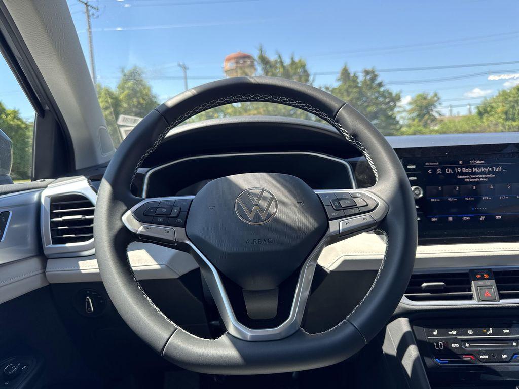 new 2025 Volkswagen Taos car, priced at $28,721