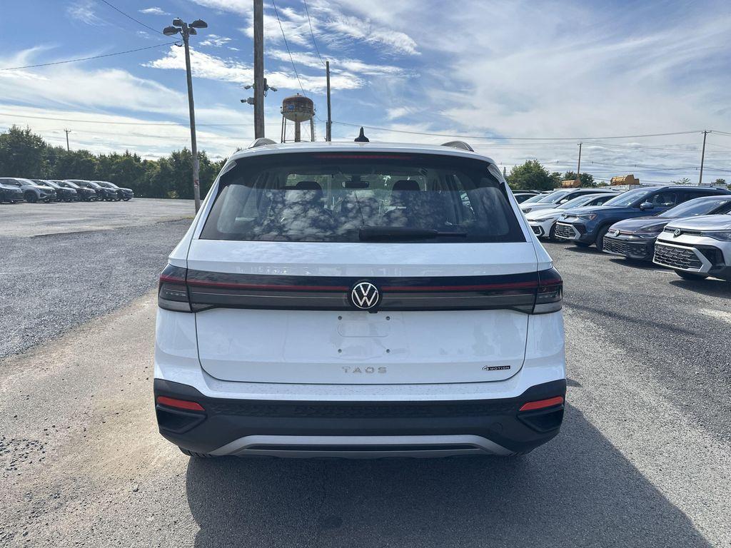 new 2025 Volkswagen Taos car, priced at $27,321