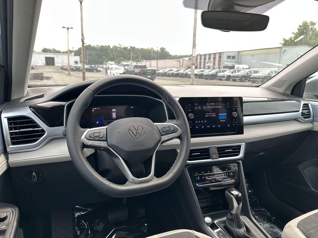 new 2025 Volkswagen Taos car, priced at $29,921