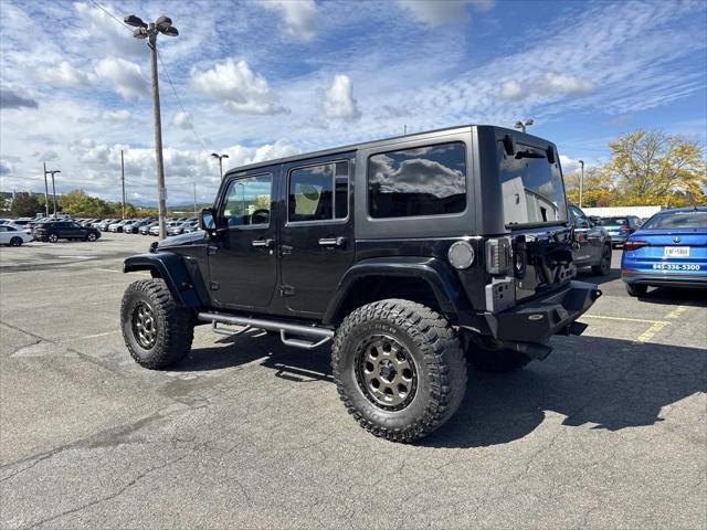 used 2015 Jeep Wrangler Unlimited car, priced at $18,999