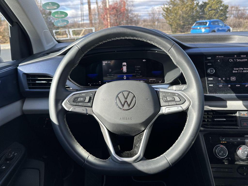 used 2023 Volkswagen Taos car, priced at $21,595
