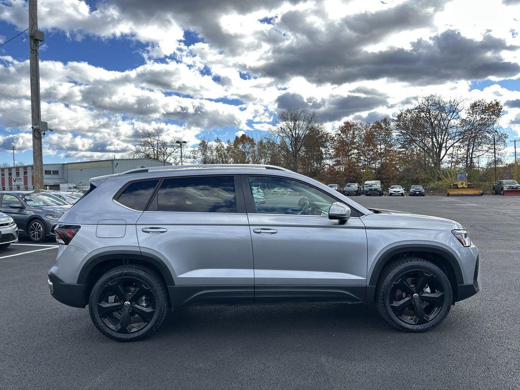 used 2025 Volkswagen Taos car, priced at $32,995