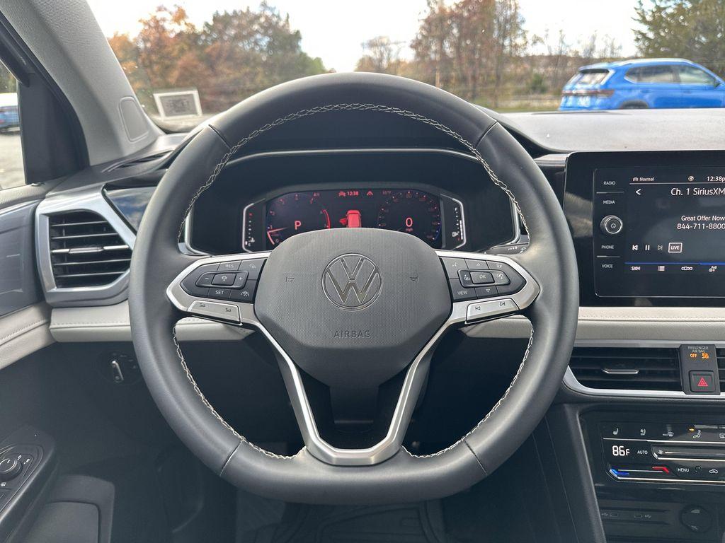 used 2025 Volkswagen Taos car, priced at $32,995