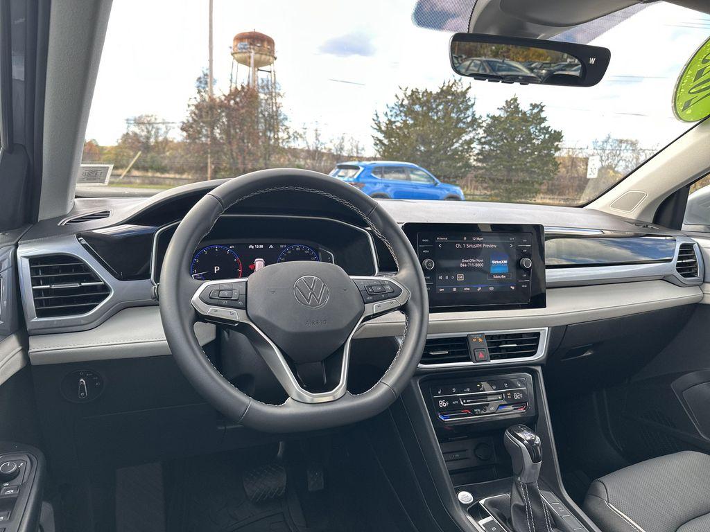 used 2025 Volkswagen Taos car, priced at $32,995