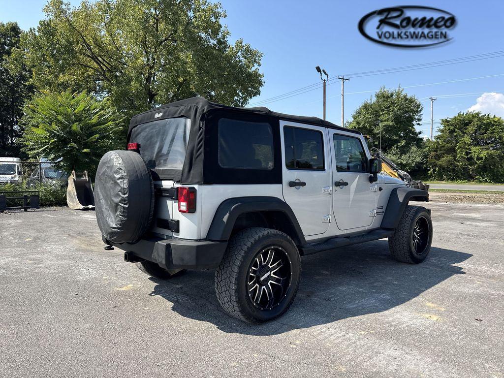 used 2012 Jeep Wrangler Unlimited car, priced at $9,799