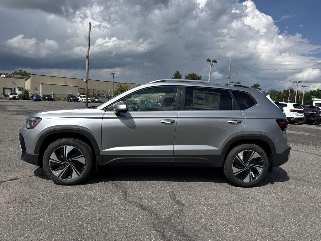new 2025 Volkswagen Taos car, priced at $30,101